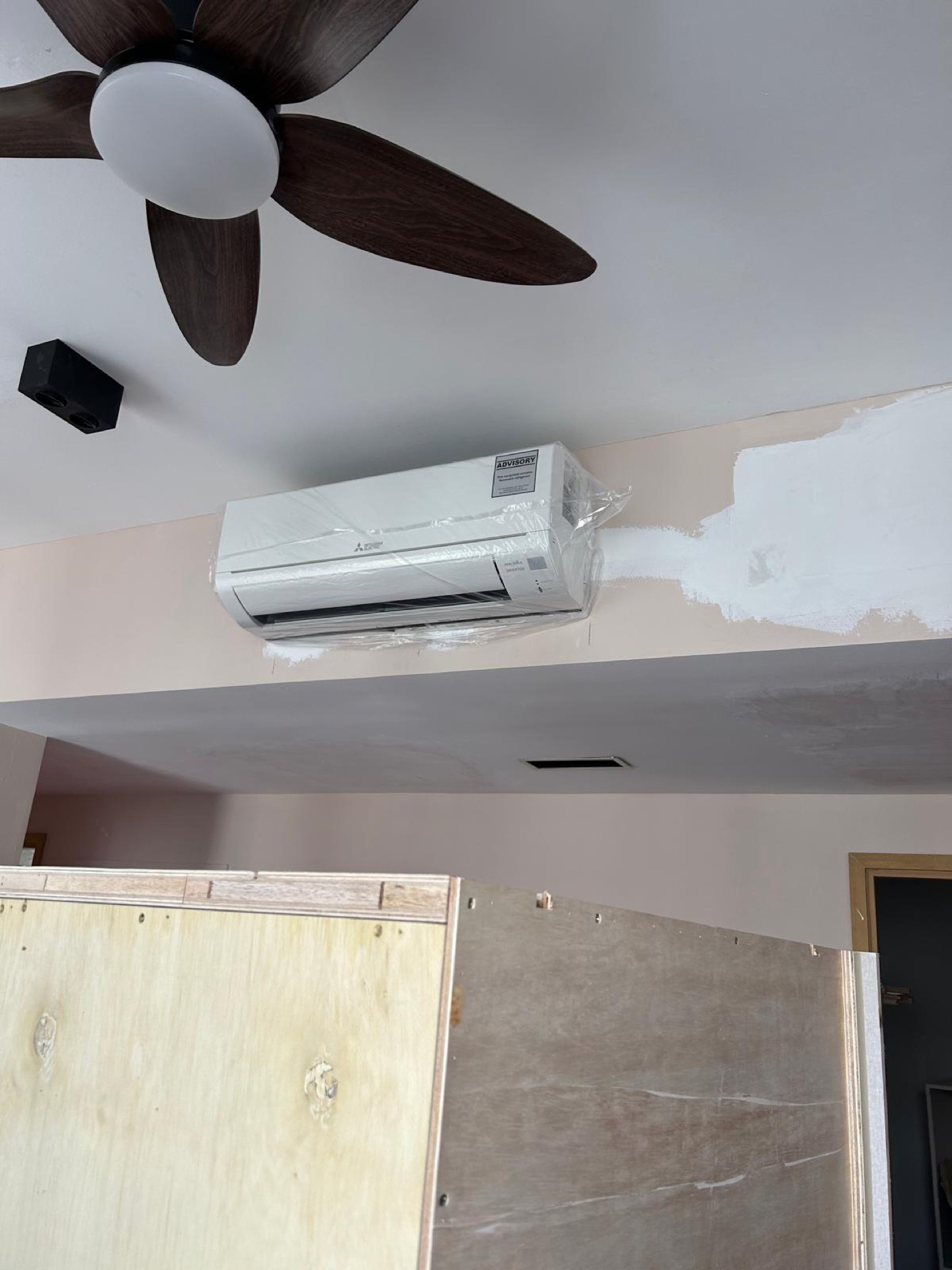 Newly installed aircon in a Singapore HDB living room